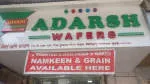 adarsh sweets and farsan company logo