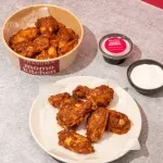 prasuma momo kitchen company logo